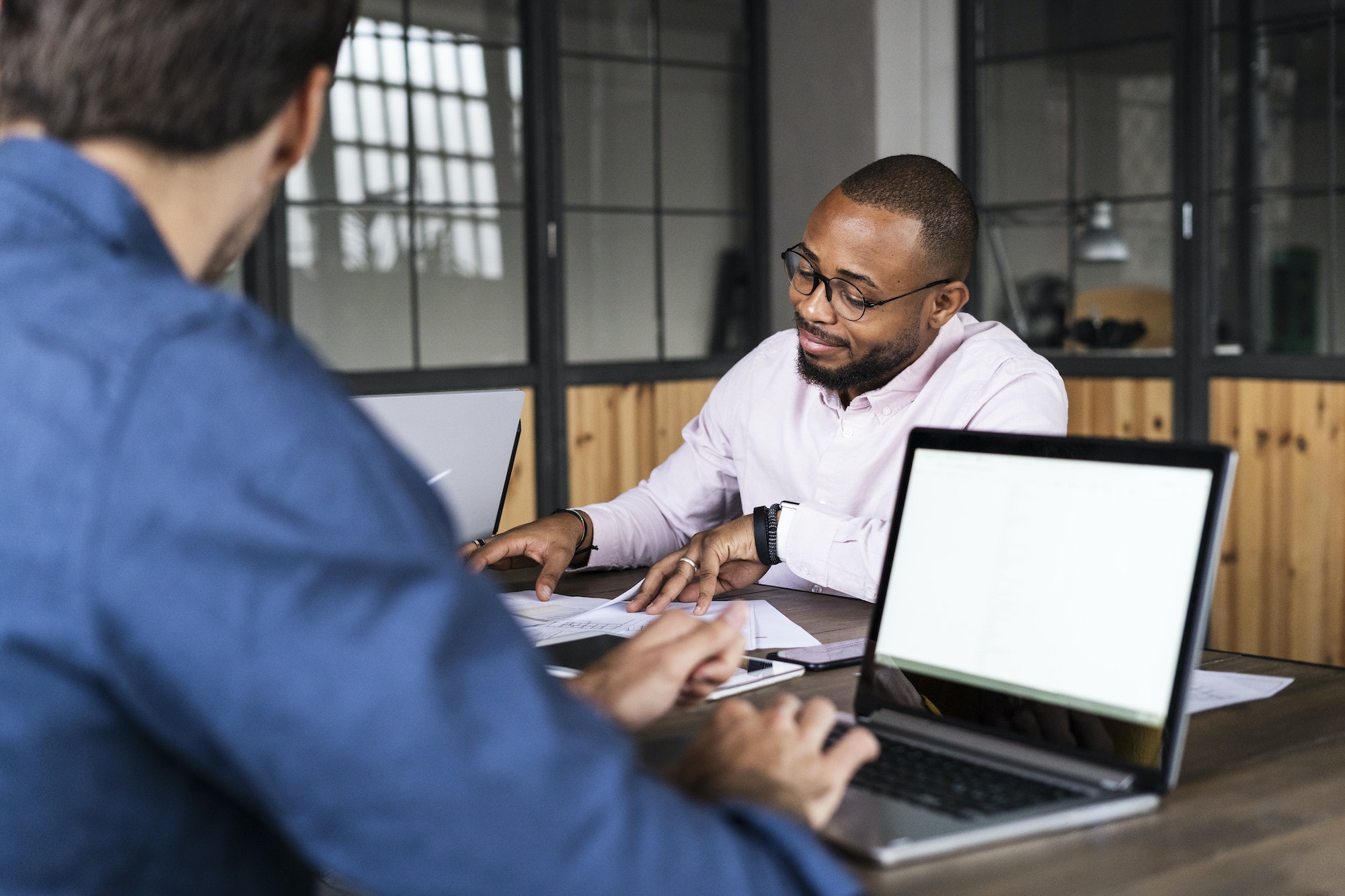 Two businessmen having a meeting in office